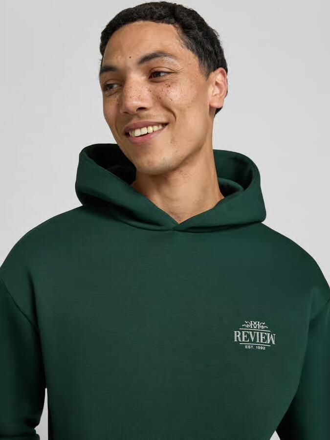 REVIEW Hoodie met logoprint en kangoeroezak