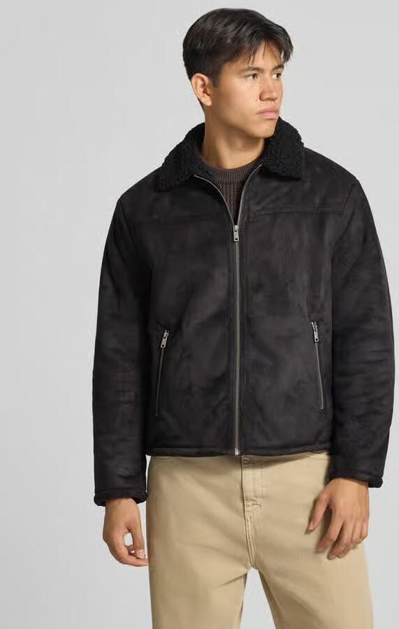 REVIEW Jack in leerlook met ritszakken - Foto 3