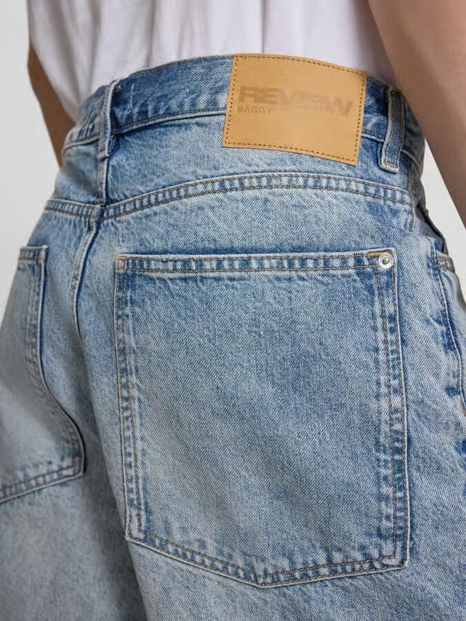 REVIEW Korte jeans in used-look met steekzakken
