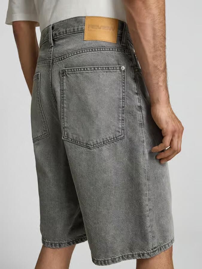 REVIEW Korte jeans in used-look met steekzakken