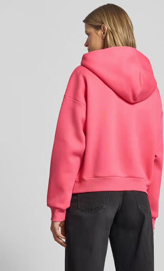 Review Oversized sweatjack met capuchon
