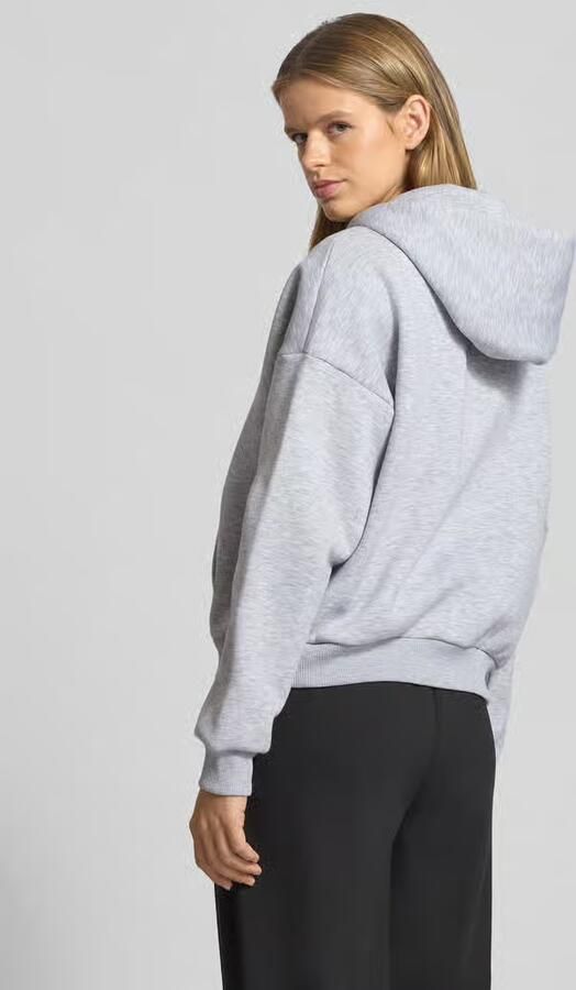 Review Oversized sweatjack met capuchon