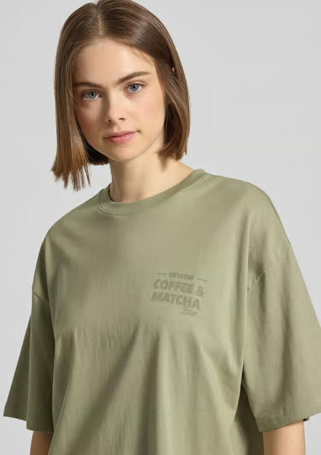REVIEW Oversized T-shirt met statementprint