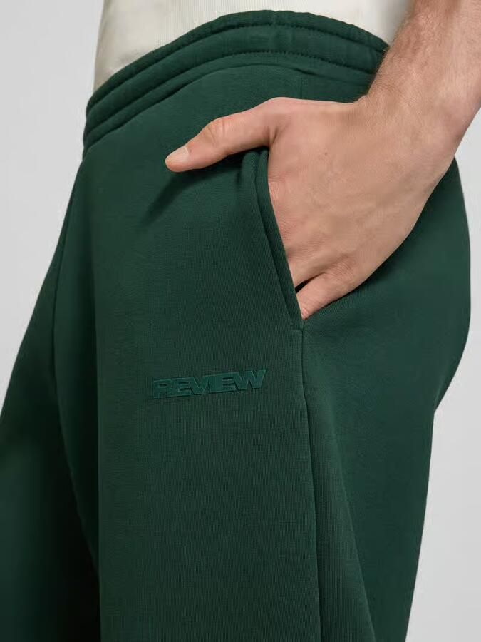 REVIEW regular fit sweatpants met achterzak
