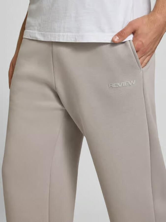 REVIEW regular fit sweatpants met achterzak