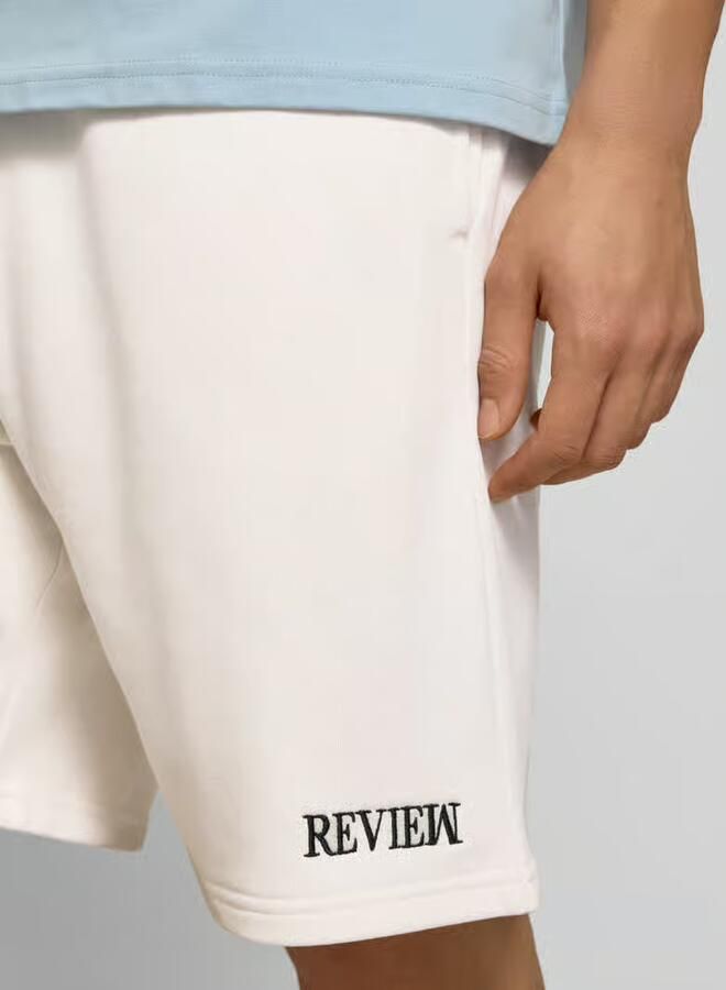 REVIEW regular fit sweatshorts met labelstitching