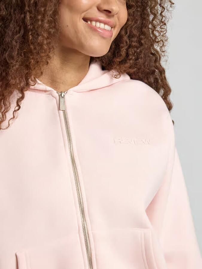 REVIEW relaxed fit sweatjack met capuchon