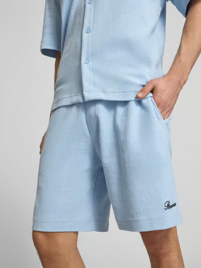 REVIEW Shorts met labelstitching