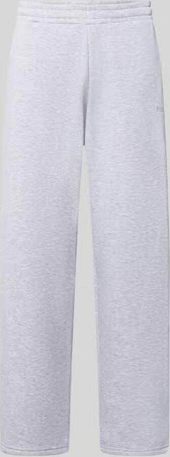 REVIEW straight fit sweatpants met logodetail