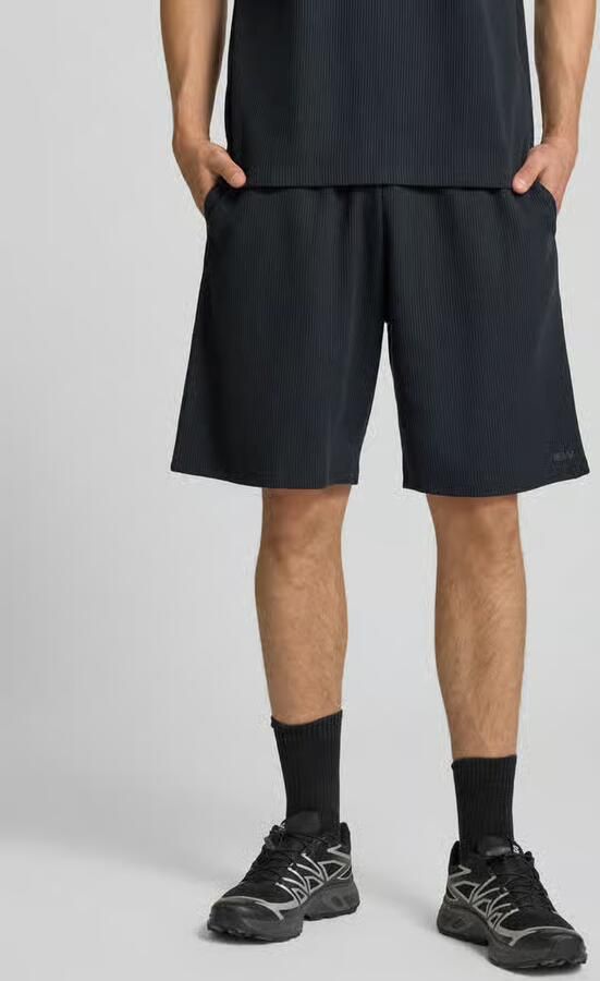 REVIEW straight fit sweatshorts met structuurpatroon - Foto 3