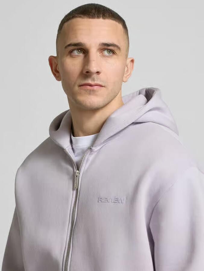 REVIEW Sweatjack met Kangoeroezak