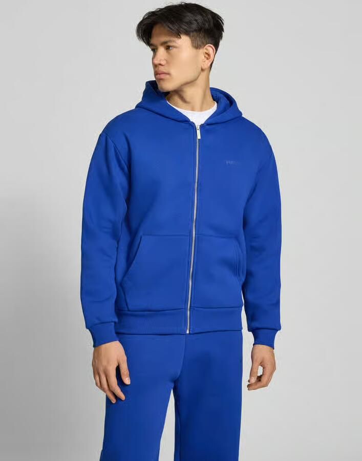REVIEW Essentials hoodie met ritssluiting en logo - Foto 2