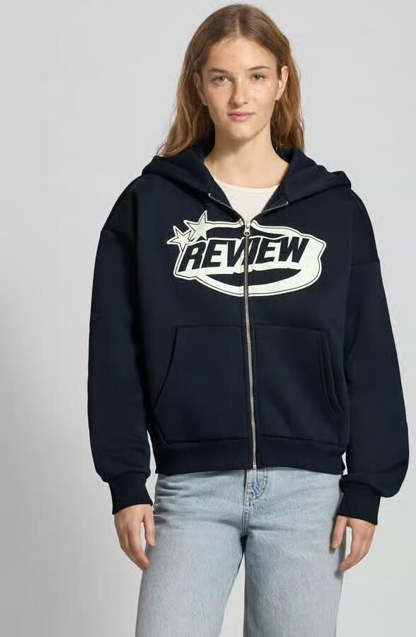 Review Sweatjack met logo en kangoeroezak - Foto 2