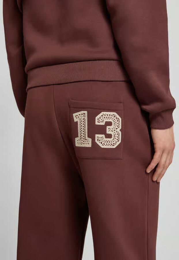 REVIEW Sweatpants met elastische tailleband en achterzak