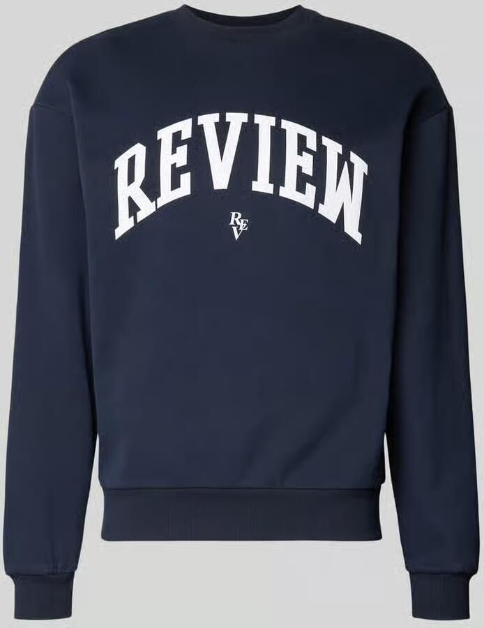 REVIEW Sweatshirt met Varsiety-emblemen
