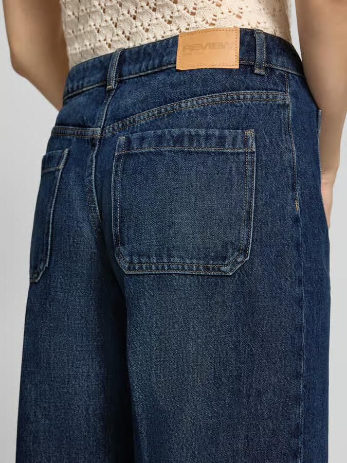 REVIEW Wide leg jeans met opgestikte zakken