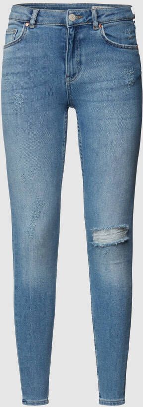 REVIEW Skinny fit jeans met destroyed-effecten