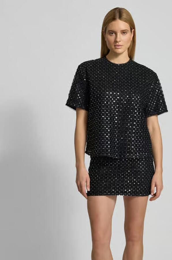 ROTATE Oversized T-shirt met sierstenen