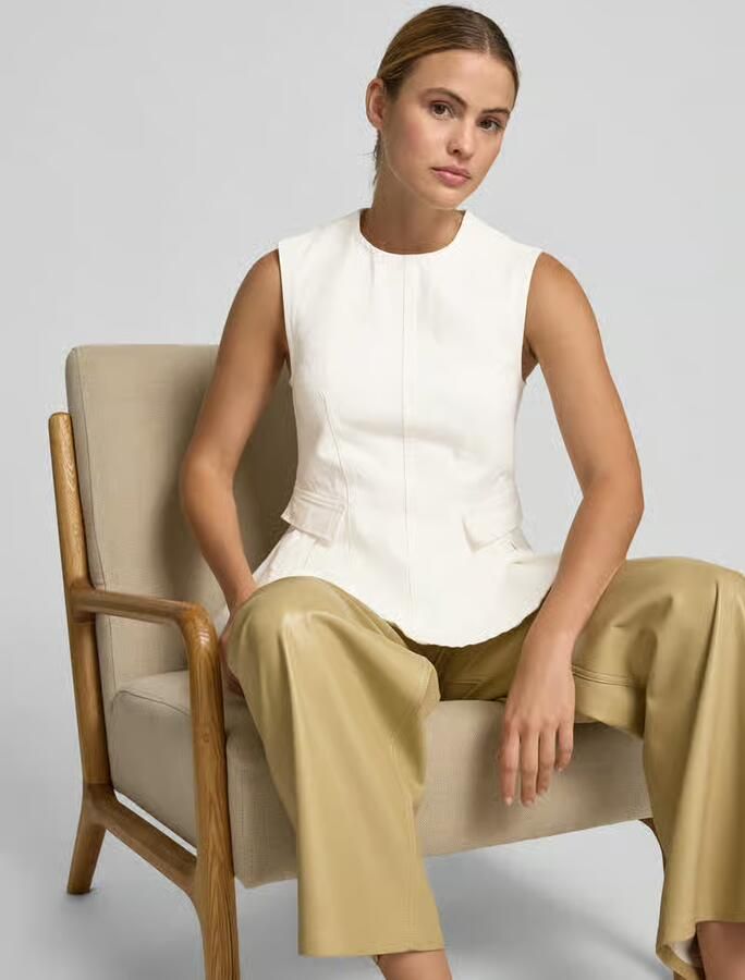 ROTATE Peplum top in denim-look
