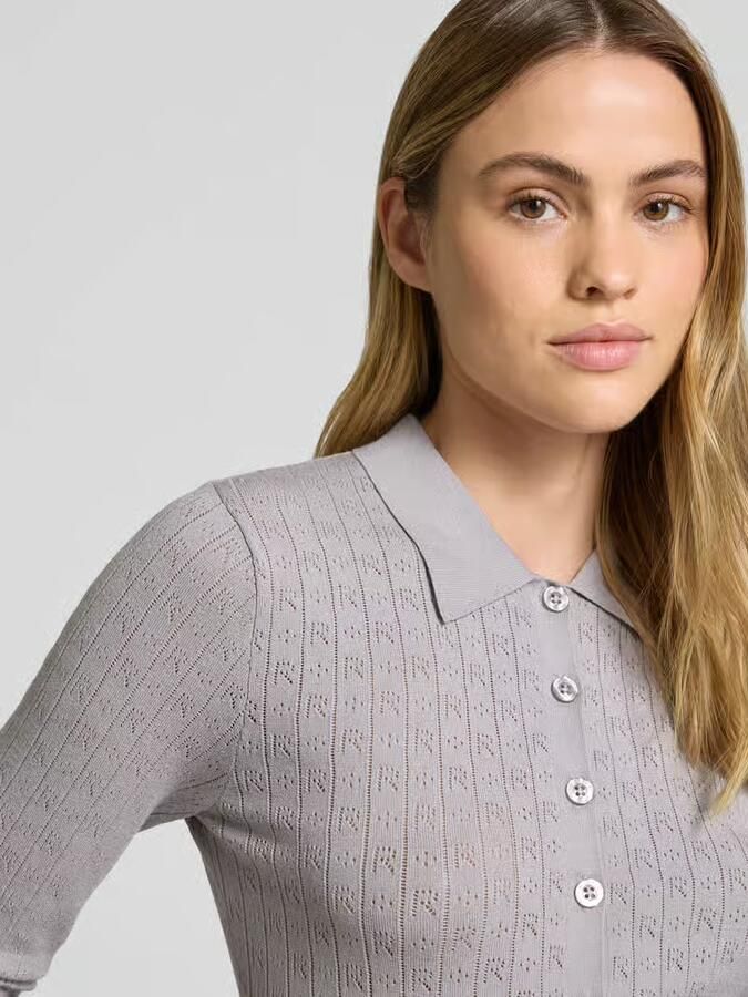 ROTATE Slim fit poloshirt in gebreide look - Foto 2