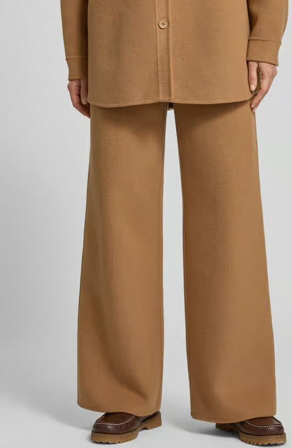 Style Icon Collection Uitlopende wide leg broek van wolmix curated by Maja Weyhe - Foto 2