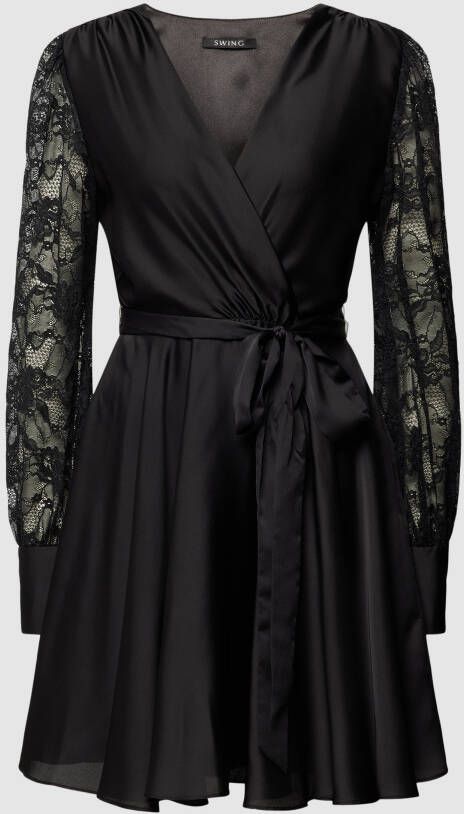 Swing Knielange cocktailjurk met strikceintuur