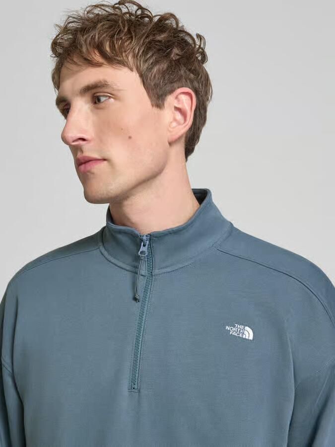 The North Face relaxed fit sweatshirt met opstaande kraag en ritssluiting
