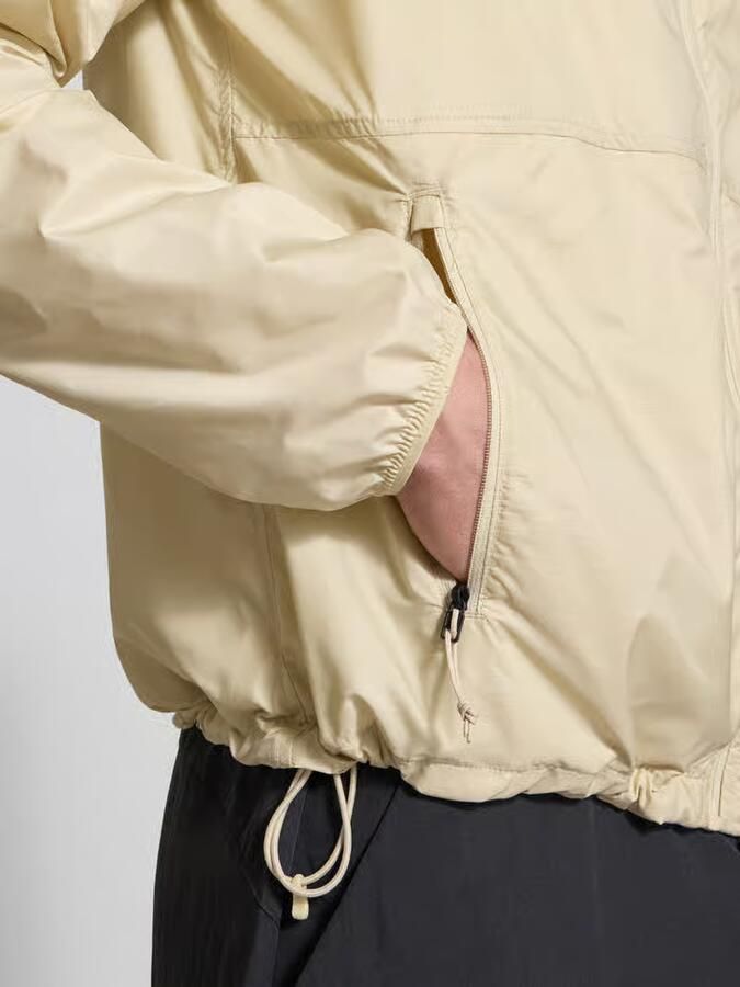 The North Face windbreaker met logo en ritszakken