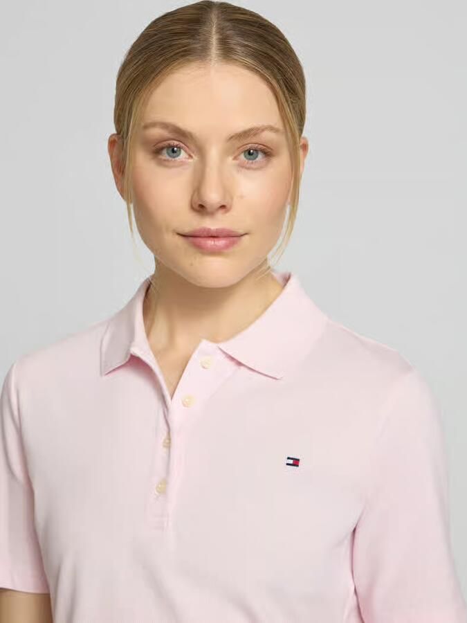 Tommy Hilfiger Poloshirt 1985 Regular Fit Pique Premium Polo met logo-borduursel met zijsplitten