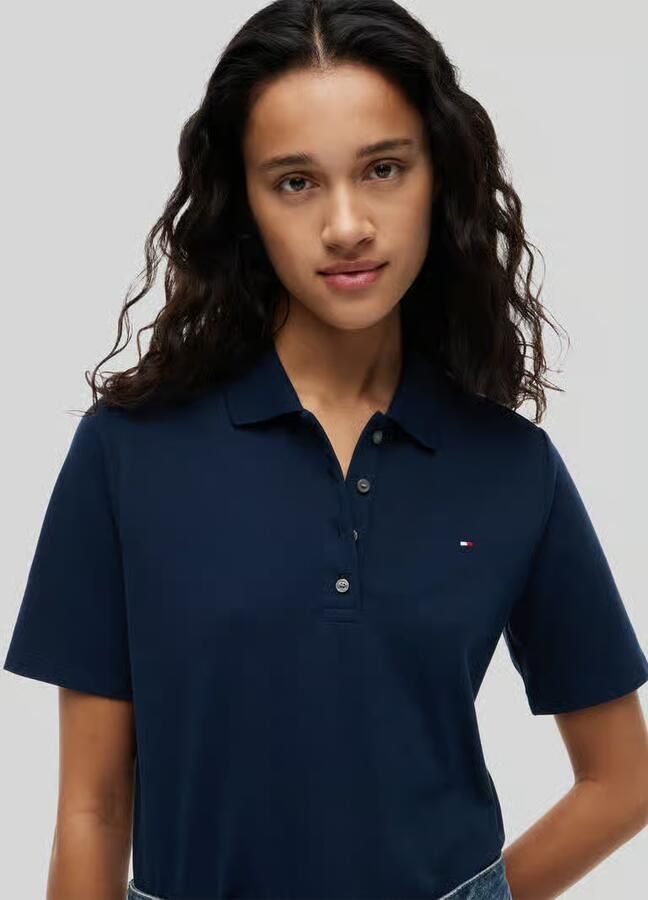 Tommy Hilfiger Poloshirt 1985 Regular Fit Pique Premium Polo met logo-borduursel met zijsplitten