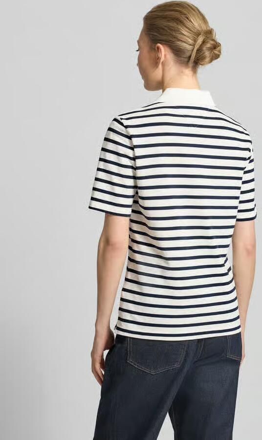 Tommy Hilfiger Poloshirt 1985 Regular Fit Pique Premium Polo met logo-borduursel met zijsplitten - Foto 7