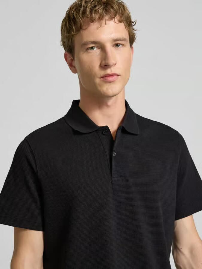 Tommy Jeans regular fit poloshirt van puur katoen