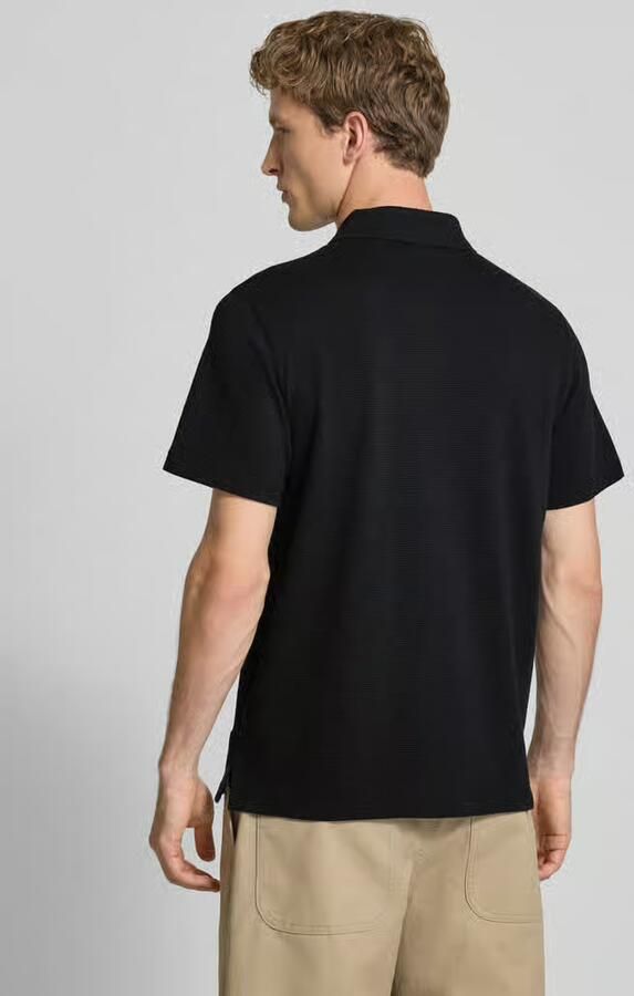 Tommy Jeans regular fit poloshirt van puur katoen