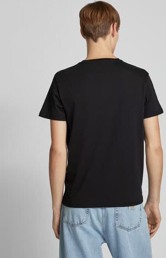 Tommy Jeans Regular fit T-shirt van puur katoen met labelopschrift