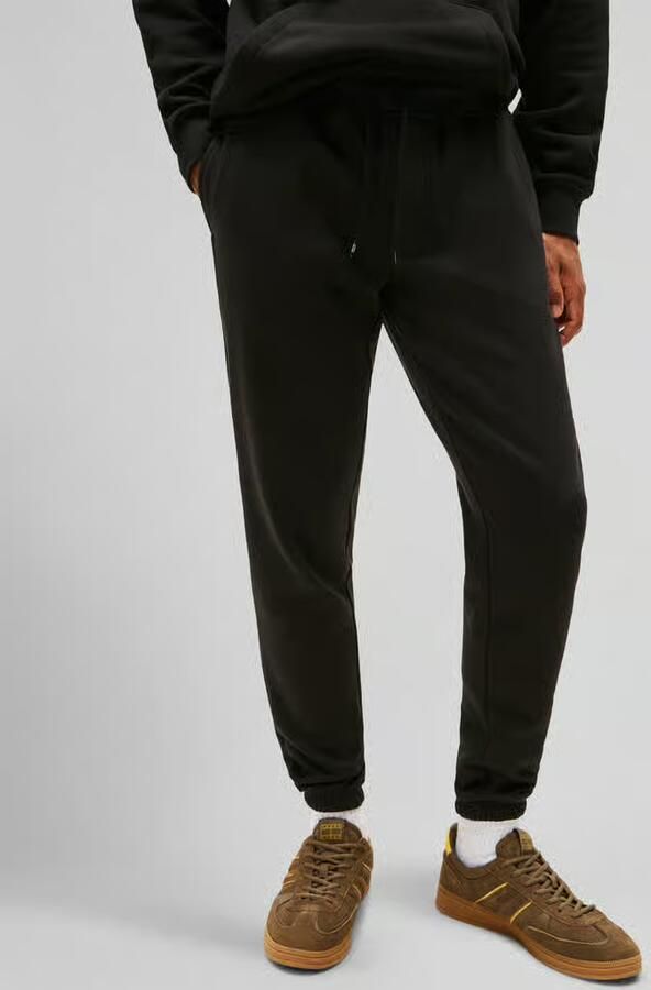 Tommy Jeans Slim fit sweatpants met gestileerde opening - Foto 15