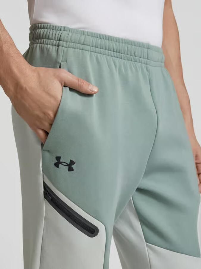 Under Armour Relaxed fit sweatpants met logoprint model 'Unstoppable'
