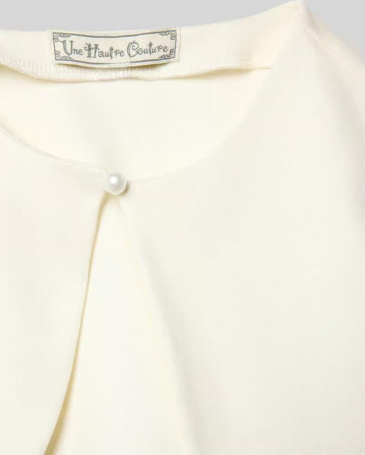 Une Hautre Couture Bolero met knoopsluiting