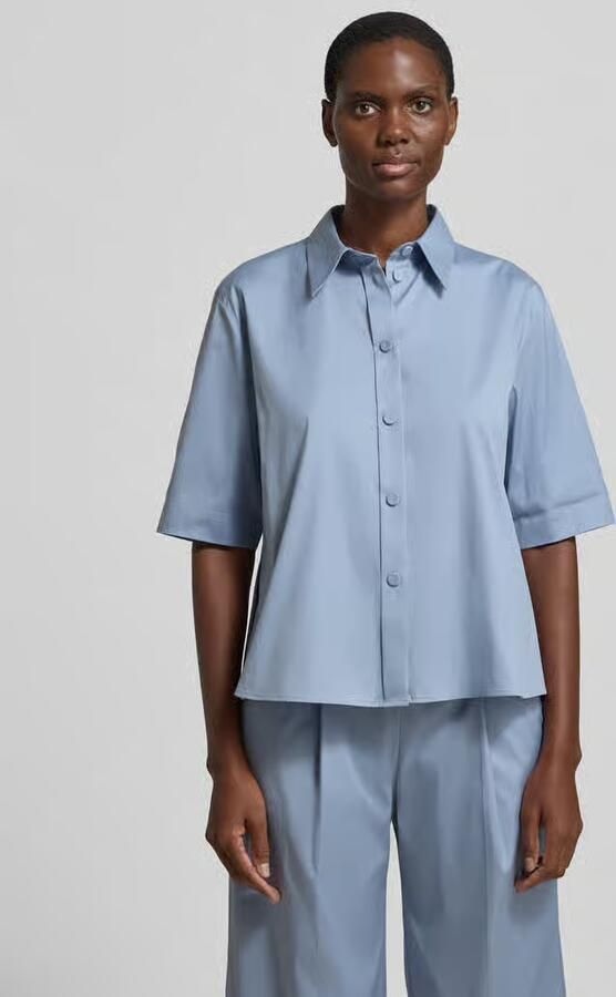 Windsor. Blouse met verlengde rug en kentkraag - Foto 2