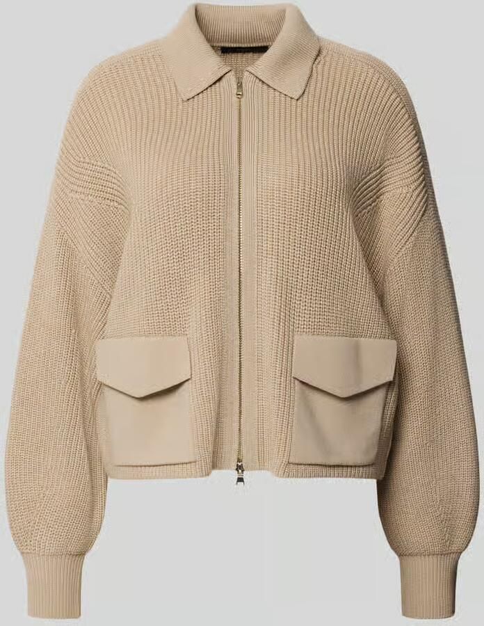 Windsor. Vest van scheerwol met klepzakken