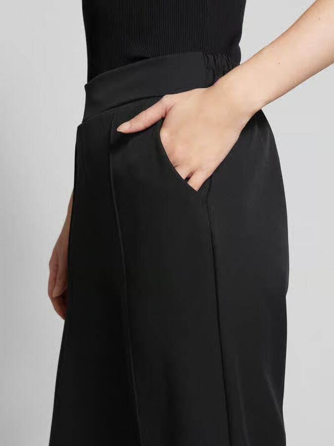 ZABAIONE Wide leg stoffen broek met vaste persplooien
