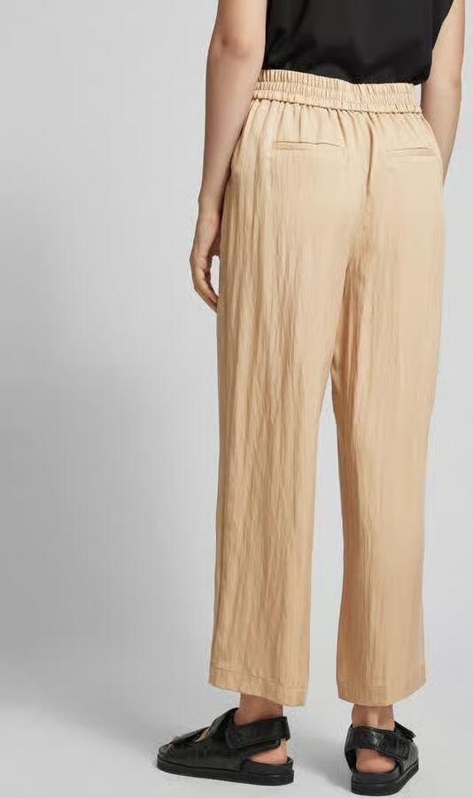 Zero Flared stoffen broek met vaste persplooien