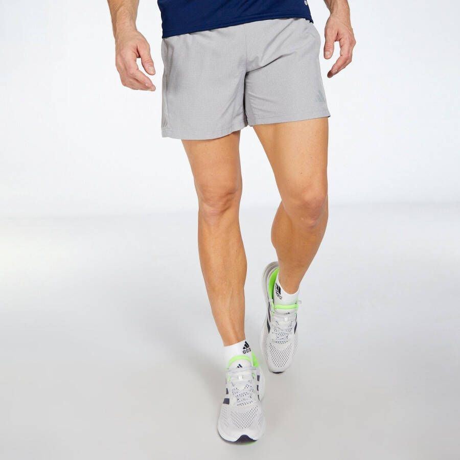 Adidas own the run heather hardloopshort grijs heren