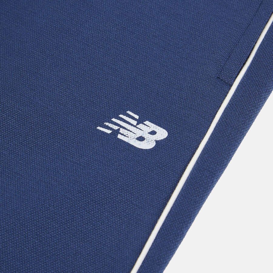 New Balance Double Knit Track Pant Unisex Trainingsbroeken blauw Kleding