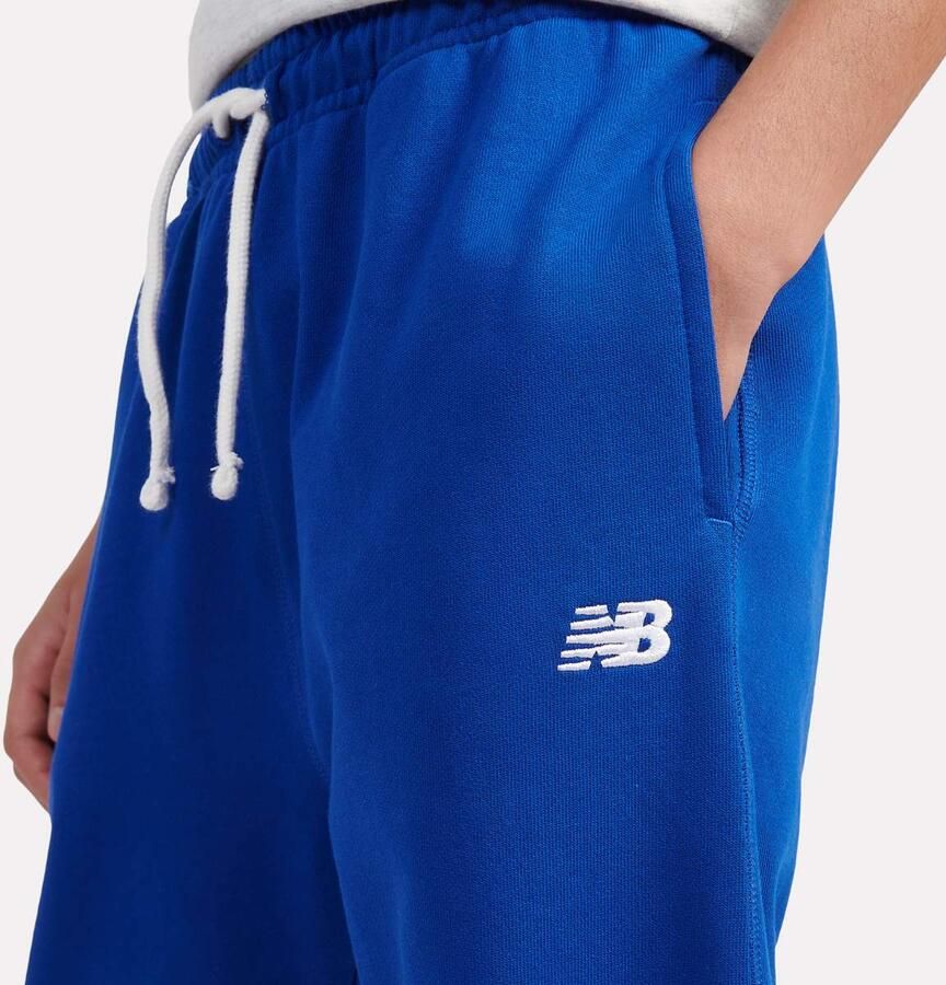 New Balance French Terry Small Logo Jogger Unisex Trainingsbroeken blauw Kleding