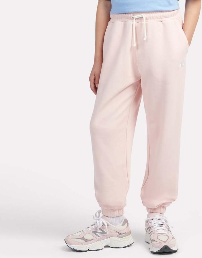 New Balance French Terry Small Logo Jogger Unisex Trainingsbroeken lichtroze Kleding - Foto 3