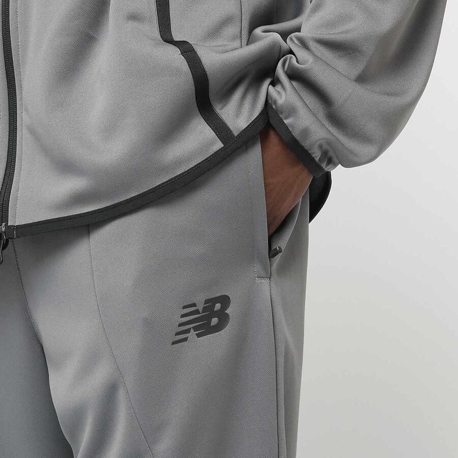 New Balance Knitted Tapered Track Pant Men Trainingsbroeken grijs Maat XL Kleding