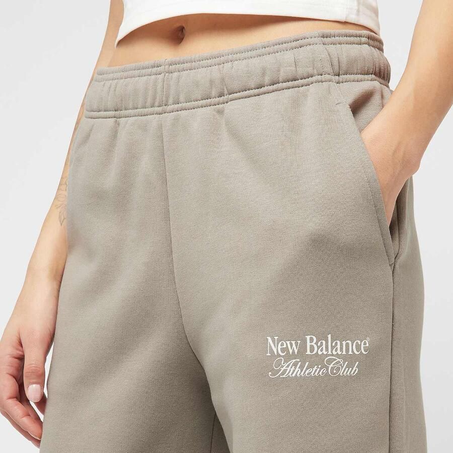 New Balance Linear Fleece Jogger Wo Trainingsbroeken beige Maat XS Kleding