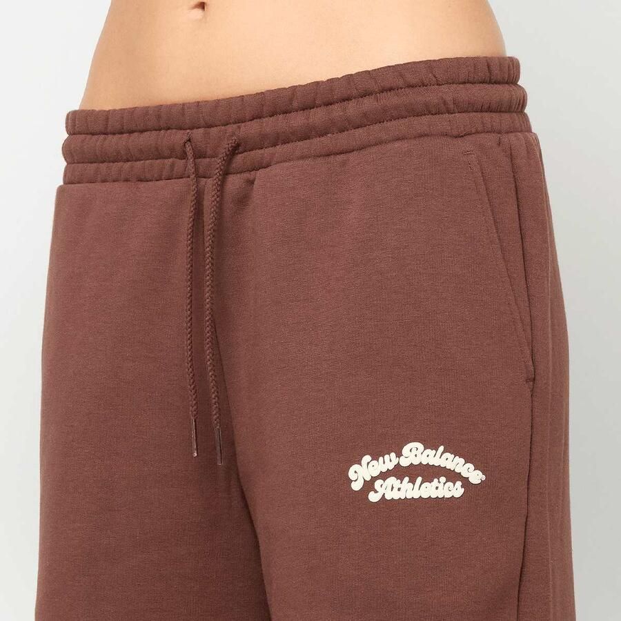 New Balance Linear Heritage Fleece Wide Leg Pant Wo Trainingsbroeken bruin Maat XS Kleding