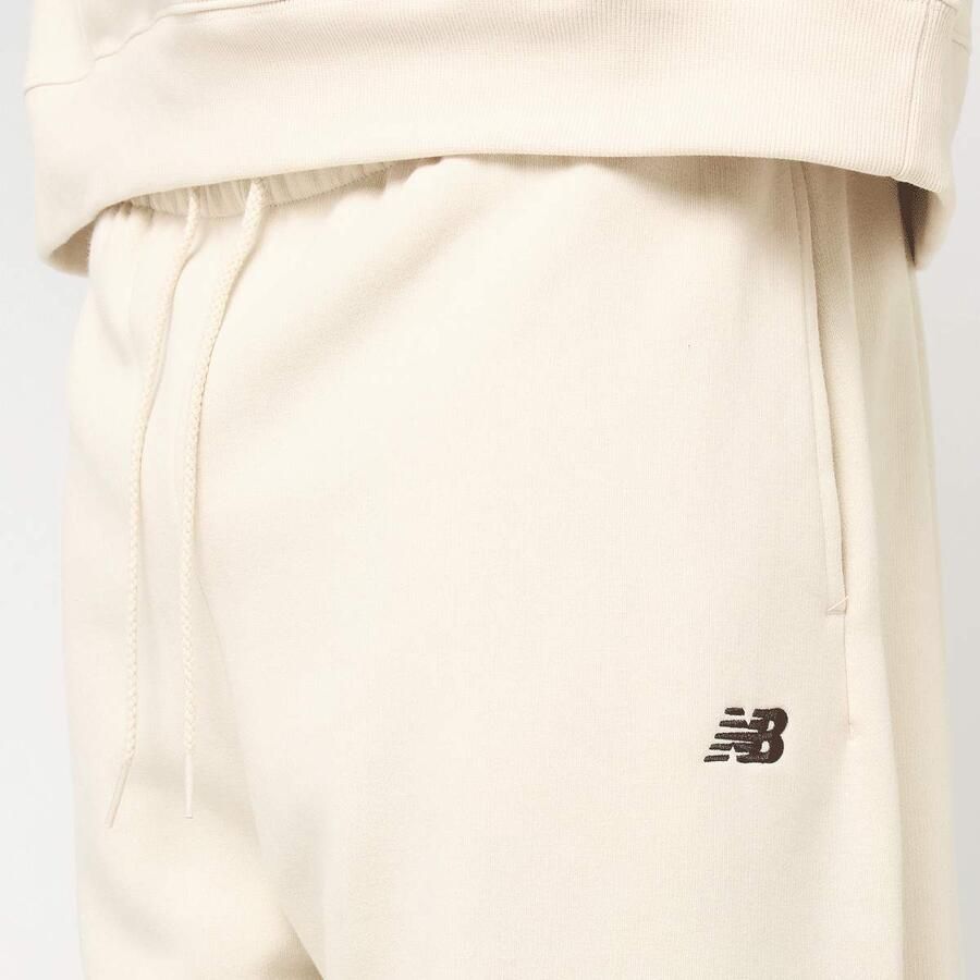New Balance Sport Essentials Wide Leg Fleece Pant Men Trainingsbroeken beige Maat XL Kleding