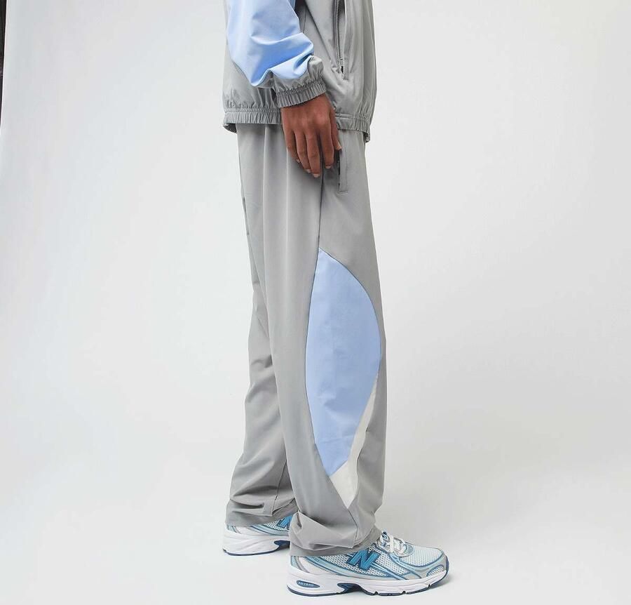 New Balance Woven Track Pant beige Men Trainingsbroeken grijs Maat XL Kleding - Foto 2